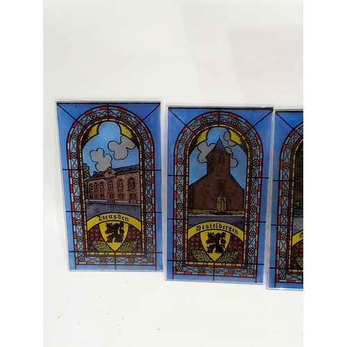 690 - 4 decorative vintage stain glass panels 20cm x 11cm