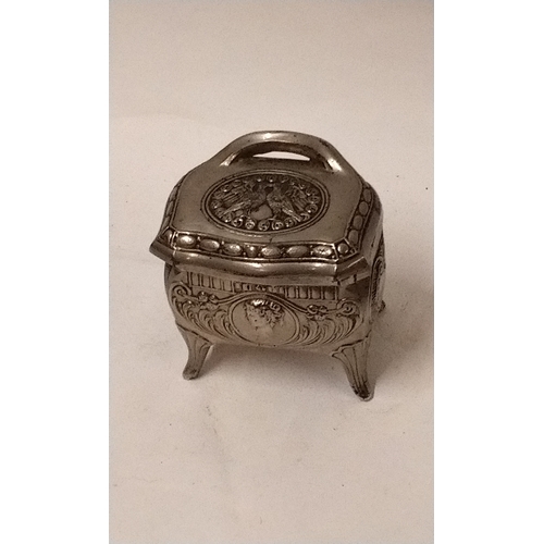 671 - Metal trinket box/casket on legs with blue lining, 10cm high x 9cm wide x 6cm deep