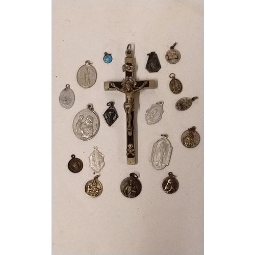 672 - Small metal crucifix 10cm long and a collection of  17 x religious medalions (18)