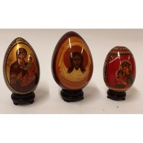 779 - 3 x hand painted decorative eggs constructed from a variety of material, tallest 14cm