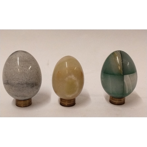 780 - 3 x egg shaped ornaments made from various rock, tallest 8cm