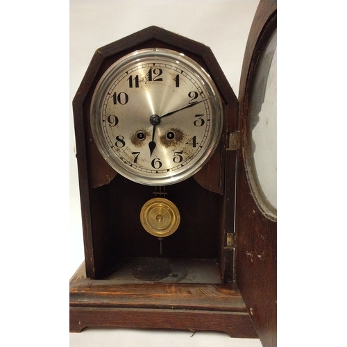 800 - Oak cased mantle clock with chime, (with key) 34cm high