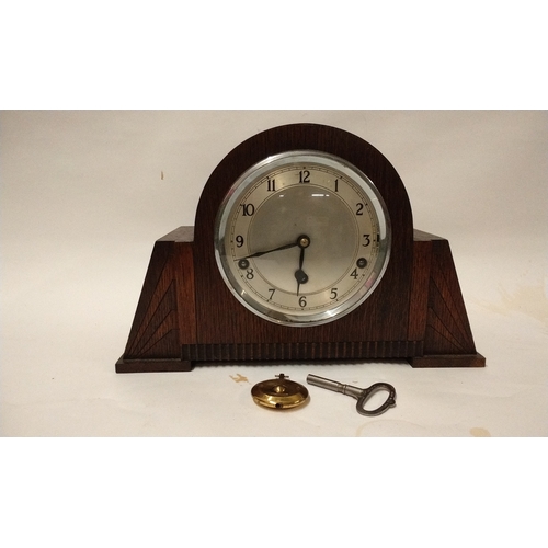 801 - 3 hole wood cased Mantle clock by Garrard 23cm high