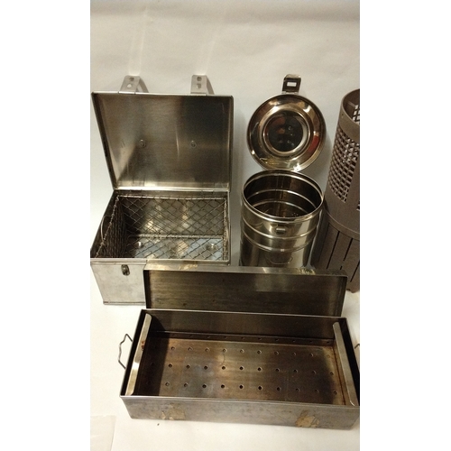 811 - 3 x Medical stainless steel sterilising boxes and a plastic holder (4)