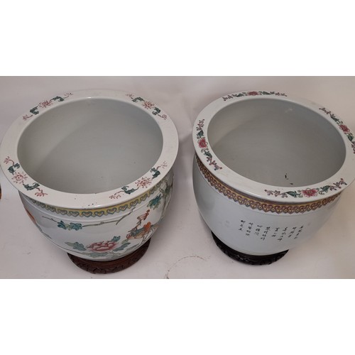 318 - A Pair Of  Large Oriental Planters / Bowls  On Wood Carved Bases both with Poem/story to one side . ... 