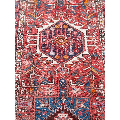 78 - Large Hand Made Red Ground Runner with 7 Geometric designs made in Iran, 355 x 90