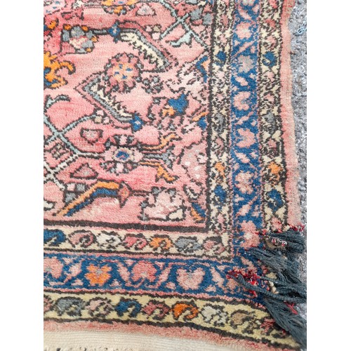 87 - Decorative Red Ground Rug 156cm x 108cm