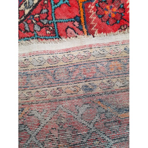 87 - Decorative Red Ground Rug 156cm x 108cm