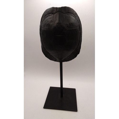 42 - Resin Sculpture of a Tortoise shell on stand finished in black, 26cm high