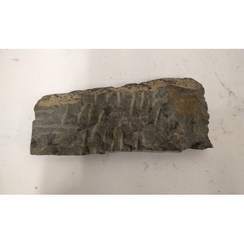 30 - Carved stone figure appear to be South American forming what may have been a frieze, 19cm long