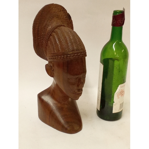 175 - Carved hardwood bust of a African boy with head dress 31cm high