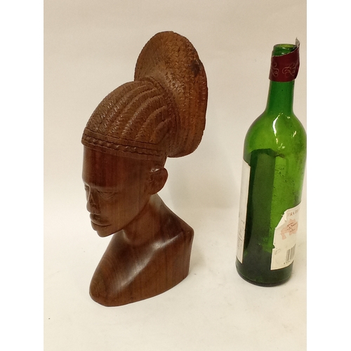 175 - Carved hardwood bust of a African boy with head dress 31cm high