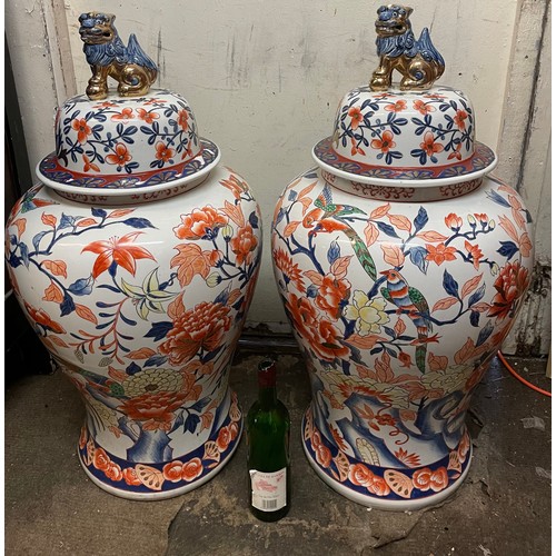 320 - A Good Large Pair Of Chinese Lidded Urns With Foo Dog Finials To Lids Along With Mark To Base.