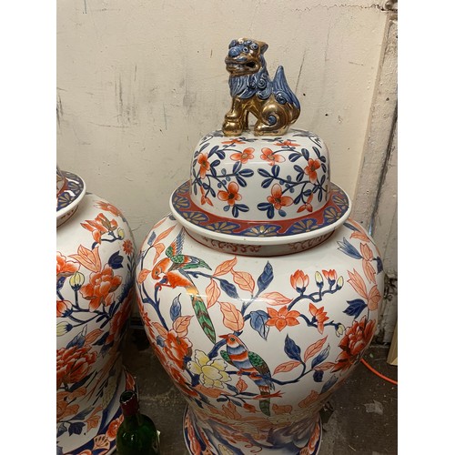 320 - A Good Large Pair Of Chinese Lidded Urns With Foo Dog Finials To Lids Along With Mark To Base.