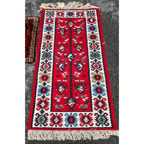 99 - 2 x small Rugs, 1 x Red ground with stylised pattern, 153 x 181 and 1 x Brown ground, 72cm x 75cm