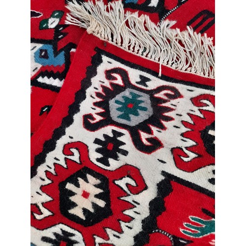 99 - 2 x small Rugs, 1 x Red ground with stylised pattern, 153 x 181 and 1 x Brown ground, 72cm x 75cm