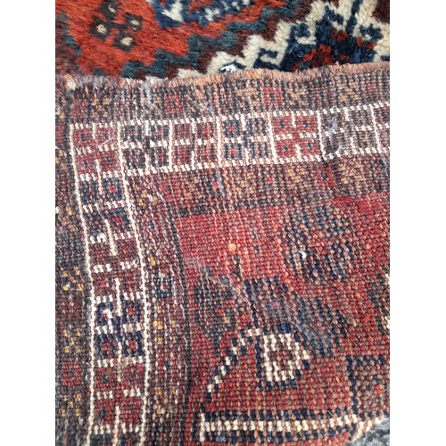 99 - 2 x small Rugs, 1 x Red ground with stylised pattern, 153 x 181 and 1 x Brown ground, 72cm x 75cm