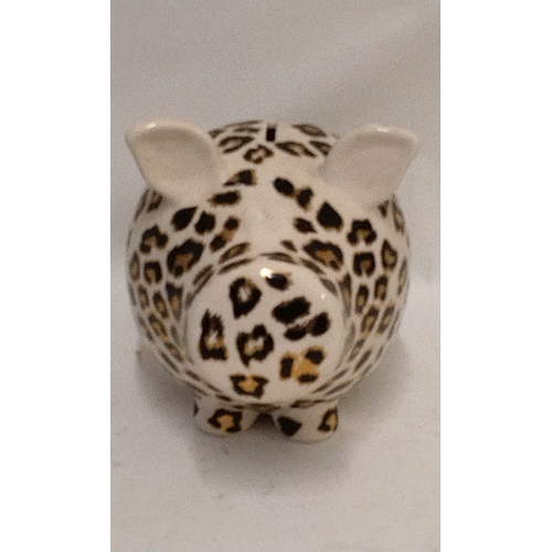 38 - Large Salt and Pepper Oink piggy bank finished in leopard print design, 21cm high x 28cm long