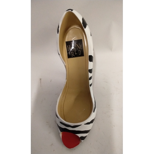 47 - Composite Wine bottle holder in the form of a stiletto shoe with Zebra pattern, 21cm high