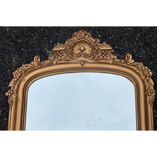 44 - Antique Gilded Full Length Mirror With Decorated Top. 180 x 54 cms