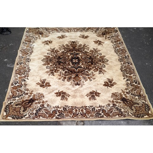 58 - Large Brown ground rug with central design, 390cm x 300cm