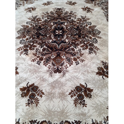 58 - Large Brown ground rug with central design, 390cm x 300cm