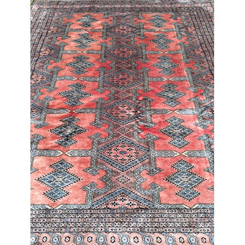 50 - large Salmon Ground Rug with black design, 300cm x 250cm