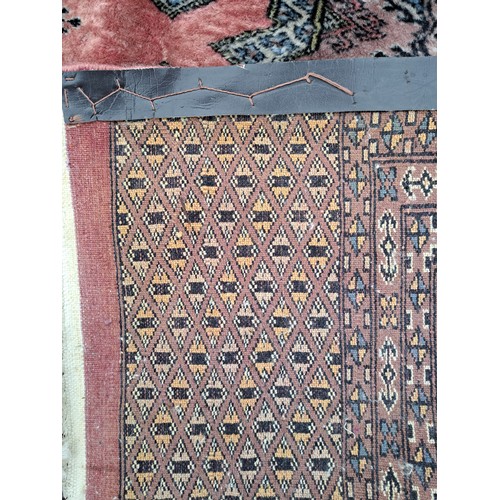 50 - large Salmon Ground Rug with black design, 300cm x 250cm