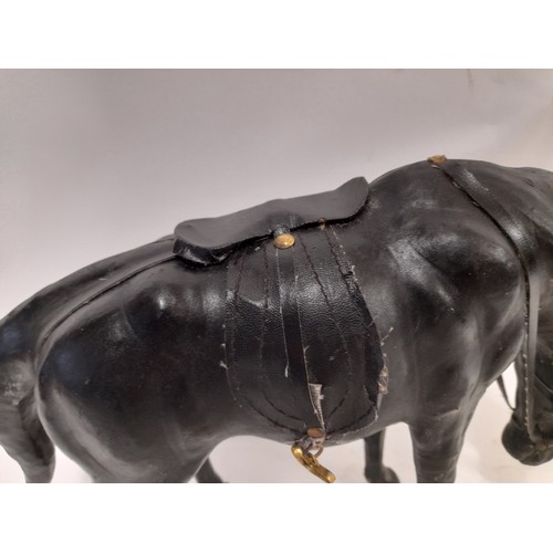 659 - Black Leather Horse, 35cm x 24cm