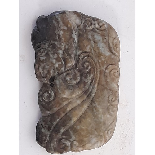 660 - Oriental carved stone / Jade ? Amulet , 8.5cm x 5.5cm