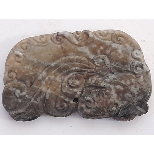 660 - Oriental carved stone / Jade ? Amulet , 8.5cm x 5.5cm