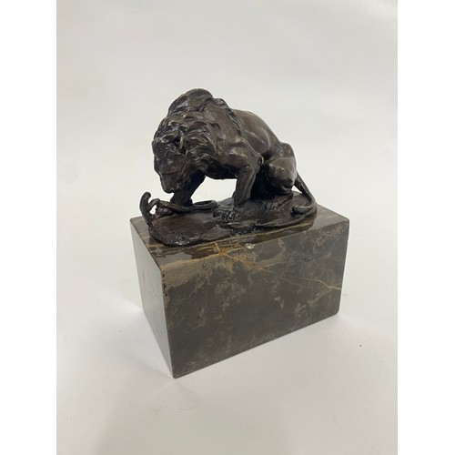 7 - Bronze  Lion Figure Raised on Marbled Base With Signature. 16cm x 12cm x 7cm