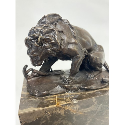 7 - Bronze  Lion Figure Raised on Marbled Base With Signature. 16cm x 12cm x 7cm