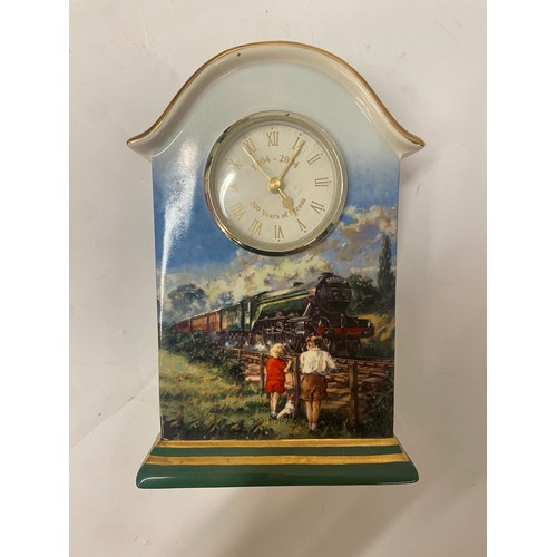 294 - Porcelain Commemorative Clock Depicting The Flying Scotsman with Certificate of Authenticity. 20cm x... 