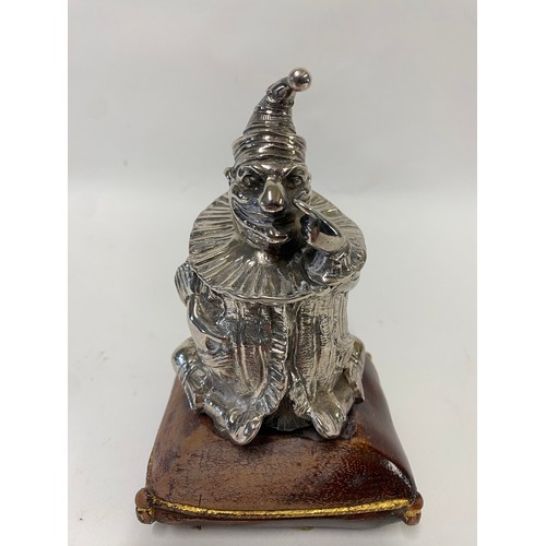 153 - White Base Metal ‘Mr Punch’ Promotional Jester Inkwell Raised on a Leather Effect Wooden Cushion 16c... 