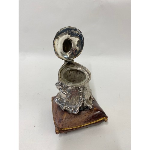 153 - White Base Metal ‘Mr Punch’ Promotional Jester Inkwell Raised on a Leather Effect Wooden Cushion 16c... 