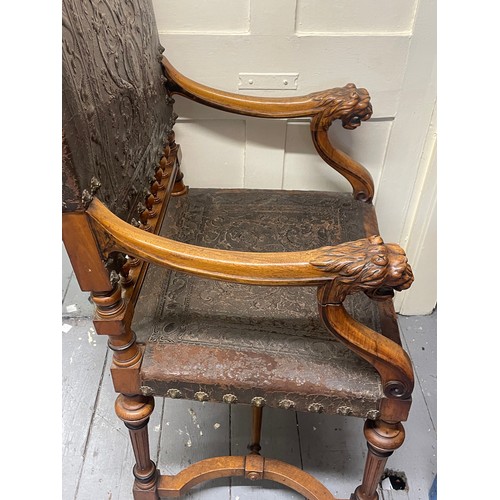 12 - Antique French Elbow Chair With Carved Lion Decoration.