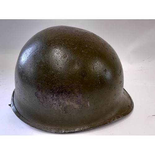 346 - US HELMET, WW2 Or  Korean war helmet with CAPAC Paratrooper liner. With a Comoflage Helmet cover