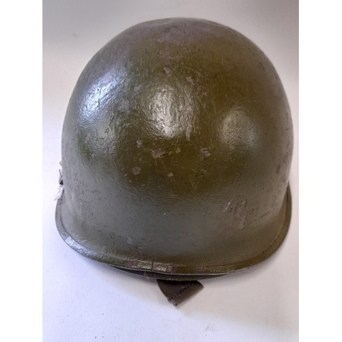 346 - US HELMET, WW2 Or  Korean war helmet with CAPAC Paratrooper liner. With a Comoflage Helmet cover