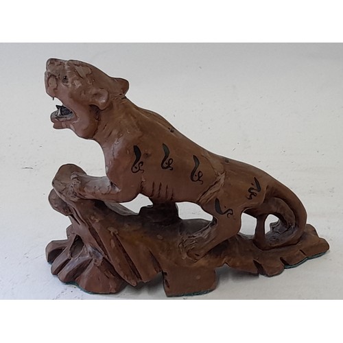 57 - Chinese carved wood Tiger with Glass eyes, 14cm long x 10cm high