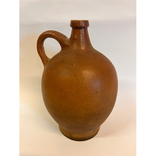 207 - Vintage Stoneware  Water Jug. Measurements 25cm x 17cm.