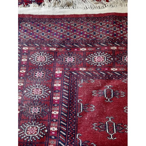 270 - Large Red Ground Rug, 215cm x 125cm