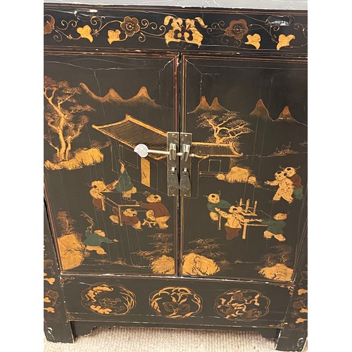 24 - Chinese Cupboard. 85 x 61 x 35 cms