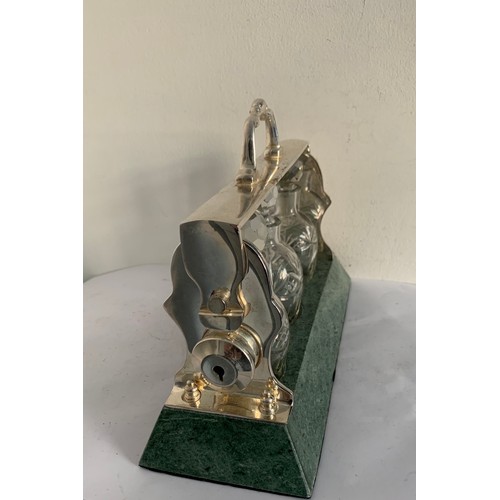 124 - 3 Bottle Tantalus On Marble Base (no key)
26 x 10 x 19.5 cms h