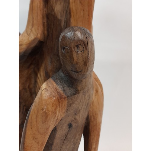 380 - Large wood carving of Mother and Children, 53cm high