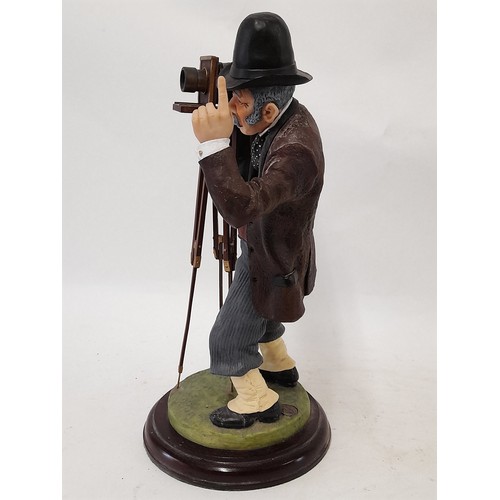 397 - The Fairweather Collection Resin Figure of a Photographer in action, 35cm high