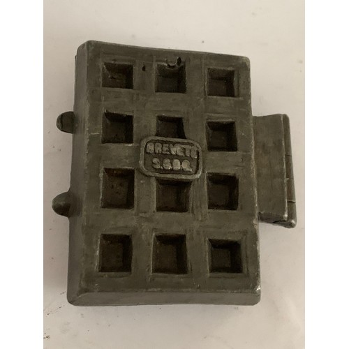 119 - Antique Chocolate Mold In The Form Of A Waffle Iron