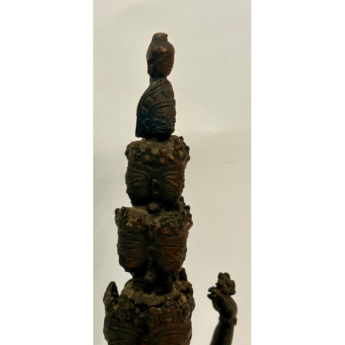 526 - Asian Bronze Sculpture of heads. 32cm x 13cm.