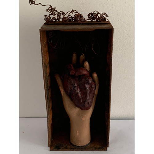 134 - Vintage Macabre Horror Movie Model Depicting A Hand Holding A Heart
14 x 28 cms h