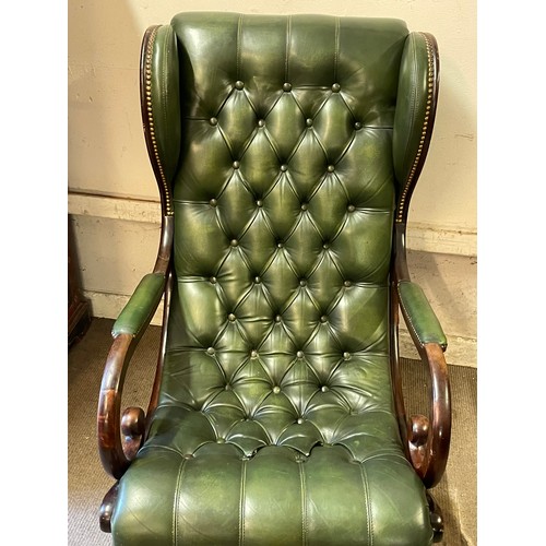 39 - Chesterfield Wing Back Leather Elbow Chair.